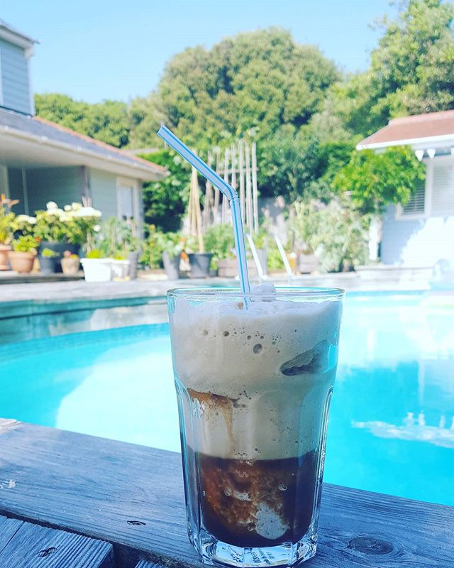 A healthy iced coffee poolside.

Fancy an icecream or a traditional iced coffee which are both full of sugar?
Instead you could make an expresso coffee and then put it in your blender or nutribullet with crushed ice and extra water. It will froth up and appear like a traditional iced coffee but with no calories or sugar.
Perfect and healthy for a hot day!