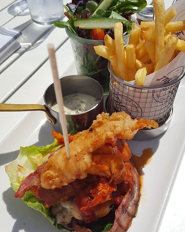 When you can't resist a lobster, burger and chips treat on the weekend 
This is the yummiest beef burger patty weekend treat
I reduced the carbs by going wheat-free no bun
With bacon, cheese and salad
And a lobster claw in tempura batter 
Lobster meat
And chips

@thehutcolwell