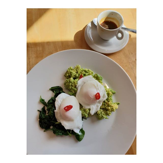 My wheat free low carb and protein breakfast.

The chef in the cafe who cooked breakfast this morning was obviously feeling creative with the chillies.
2 poached eggs on crushed avocado with chillies and wilted spinach. No toast and an espresso.