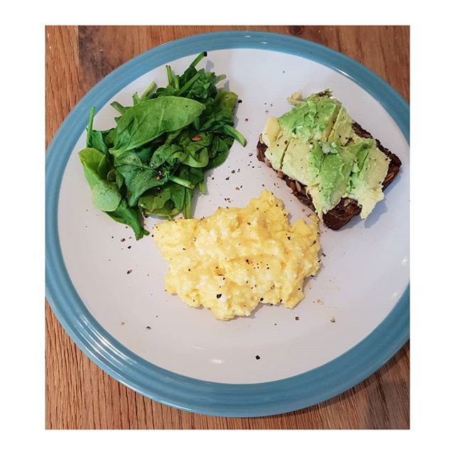 Healthy low carb and protein post workout breakfast.

Scrambled eggs with organic butter, wilted spinach, and smashed avocado on seeded multigrain  toast. A nutritious breakfast to keep you feeling fuller longer with less blood sugar highs and lows. 
12 hours since last meal and this 1st meal of the day to help digestion.
I start the day with warm lemon water and then a small swig of Kefir with a liquid multi-vitamin mixed in with it.  All fermented foods help to promote good gut health.
.
.
.
.
.